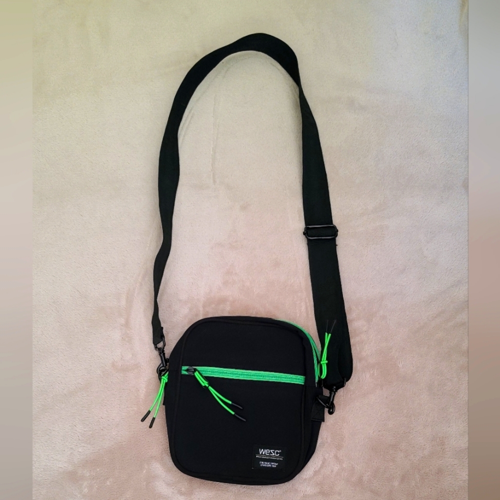 Wesc crossbody bag black with neon green accents.